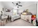 Cozy bedroom featuring a dresser, bed, and fun decor at 3144 Dark Sky Dr, Harmony, FL 34773