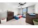 bedroom showcasing a race car bed, ceiling fan, and a bright window at 3144 Dark Sky Dr, Harmony, FL 34773