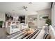 A furnished living room shows the dining area and kitchen at 3212 Preserve Dr, Orlando, FL 32824