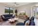 A stylish living room features a TV and modern furniture at 3212 Preserve Dr, Orlando, FL 32824