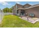 Spacious backyard with a white vinyl fence, perfect for outdoor activities and relaxation at 3221 Bayflower Ave, Harmony, FL 34773