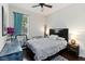 Comfortable bedroom with natural light and stylish furnishings at 3221 Bayflower Ave, Harmony, FL 34773