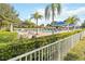 Relaxing community pool area with lounge chairs and shaded seating at 3221 Bayflower Ave, Harmony, FL 34773