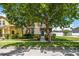 Charming two-story home with manicured lawn and sidewalk, offering a welcoming curb appeal at 3221 Bayflower Ave, Harmony, FL 34773