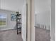 Bedroom with an open door and shelf decor at 33 Peterlee Ct, Kissimmee, FL 34758