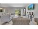 Tastefully decorated living room with a comfortable sofa, contemporary decor, and a bright, airy atmosphere at 33 Peterlee Ct, Kissimmee, FL 34758