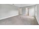 The bedroom features carpeted flooring and access to an attached bathroom at 35 Peterlee Ct, Kissimmee, FL 34758