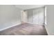 Bedroom with carpeted floor, grey walls, white trim, and bright, natural light at 35 Peterlee Ct, Kissimmee, FL 34758
