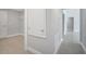 Hallway features tile flooring with doorways leading to other rooms at 35 Peterlee Ct, Kissimmee, FL 34758