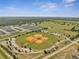 Community baseball field, with a well-maintained park, surrounded by residential neighborhoods at 355 Churchill Ct, Kissimmee, FL 34759