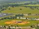 Aerial view of the community baseball park with well-maintained fields and facilities at 355 Churchill Ct, Kissimmee, FL 34759