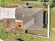 Aerial view of a home featuring a well manicured lawn and a fenced in yard at 355 Churchill Ct, Kissimmee, FL 34759