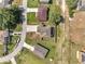 Aerial view of a home featuring mature landscaping and a fenced-in yard at 355 Churchill Ct, Kissimmee, FL 34759