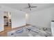 Bright bedroom with airplane themed rug, hardwood floors, and ample space at 355 Churchill Ct, Kissimmee, FL 34759