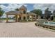 Scenic view of the Lake Ashton entrance, complete with manicured landscaping and a welcoming fountain at 4056 Ashton Club Dr, Lake Wales, FL 33859