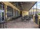 Charming outdoor patio with tables and chairs, perfect for dining and entertaining at 4056 Ashton Club Dr, Lake Wales, FL 33859