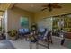 Comfortable seating on this screened patio offers views of lush landscaping at 4056 Ashton Club Dr, Lake Wales, FL 33859