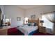 Bedroom featuring a King bed, with matching nightstands, and a window at 408 Bloomingdale Dr, Davenport, FL 33897