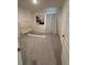 Bedroom with neutral colors, large window, and minimalist design at 464 Talisi Loop, St Cloud, FL 34771