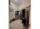 Walk-in closet with organized shelving and ample storage space for clothing and accessories at 464 Talisi Loop, St Cloud, FL 34771