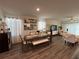 Open-concept dining area featuring a wooden table and comfortable seating at 464 Talisi Loop, St Cloud, FL 34771