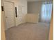 Cozy loft featuring neutral carpeting, ample natural light, and versatile space at 464 Talisi Loop, St Cloud, FL 34771