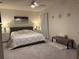 Serene main bedroom boasting soft lighting, neutral tones, and stylish decorative accents at 464 Talisi Loop, St Cloud, FL 34771
