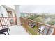 View from balcony overlooking complex parking and other buildings at 4862 Cayview Ave # 40409, Orlando, FL 32819
