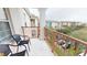 A cozy balcony with seating and view of the complex, great spot to relax outdoors at 4862 Cayview Ave # 40409, Orlando, FL 32819