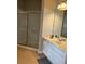 Neat bathroom with updated vanity and a glass-enclosed shower at 4862 Cayview Ave # 40409, Orlando, FL 32819