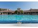 Beautiful swimming pool with lounge chairs for relaxation in a resort-style community at 4862 Cayview Ave # 40409, Orlando, FL 32819