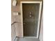 Apartment 308 front door showing door lock and knocker, well lit area at 6137 Metrowest Blvd # 308, Orlando, FL 32835