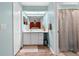 Bathroom featuring an updated vanity and a shower/tub combo with modern fixtures at 6441 Nightwind Cir, Orlando, FL 32818