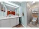 Bathroom featuring an updated vanity and a shower/tub combo with modern fixtures at 6441 Nightwind Cir, Orlando, FL 32818