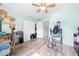 Bedroom featuring wood-look flooring, light blue paint scheme, and ceiling fan at 6441 Nightwind Cir, Orlando, FL 32818