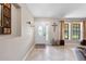 Inviting entryway with tiled flooring, decorative accents, and natural light, creating a warm welcome at 6441 Nightwind Cir, Orlando, FL 32818