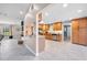Spacious kitchen with stainless steel appliances, wood cabinets, and ample counter space with a breakfast bar at 6441 Nightwind Cir, Orlando, FL 32818