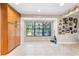 Bright eat-in kitchen area features cabinets, a window, and tile flooring, and space for dining at 6441 Nightwind Cir, Orlando, FL 32818