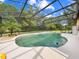 Sparkling pool with screened enclosure, ideal for outdoor enjoyment and privacy at 6441 Nightwind Cir, Orlando, FL 32818