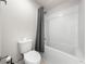 Bathroom featuring tiled shower and toilet at 7413 Bent Tree Loop, St Cloud, FL 34771