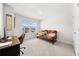 Bright room with desk, futon, and large window offering natural light at 7413 Bent Tree Loop, St Cloud, FL 34771