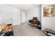Bright bedroom featuring a desk, chair, and comfortable futon at 7413 Bent Tree Loop, St Cloud, FL 34771