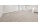 Spacious bonus room with multiple entrances and plush carpeting at 7413 Bent Tree Loop, St Cloud, FL 34771