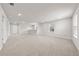 Bonus room with plush carpet, recessed lighting, and natural light to create a welcoming space at 7413 Bent Tree Loop, St Cloud, FL 34771