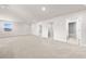 Spacious bonus room with plush carpet, natural light, and neutral paint throughout at 7413 Bent Tree Loop, St Cloud, FL 34771