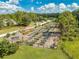 Aerial view of a large community garden with several plots and seating area at 7413 Bent Tree Loop, St Cloud, FL 34771