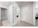 Upstairs hallway with access to bedrooms and bathrooms at 7413 Bent Tree Loop, St Cloud, FL 34771