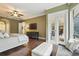 Bedroom with access to the outdoor living area through glass french doors at 8214 Lake Serene Dr, Orlando, FL 32836