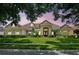 Charming home featuring manicured landscaping and a welcoming entrance at 8214 Lake Serene Dr, Orlando, FL 32836