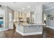 Gourmet kitchen featuring granite countertops, custom cabinets, and stainless steel appliances at 8214 Lake Serene Dr, Orlando, FL 32836